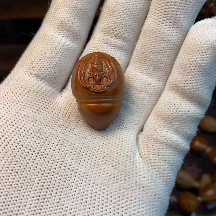 庆***年橄榄核手串/手链2.18雕刻三通