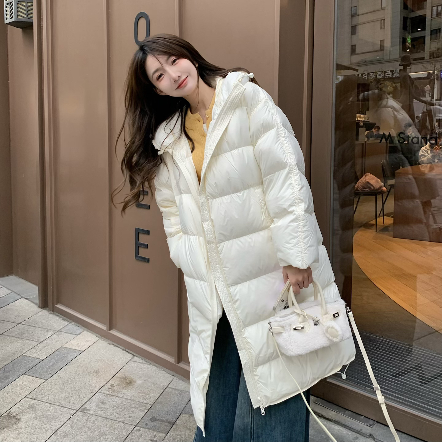 毛小兔2025冬季新款长款连帽两色可选鹅绒服