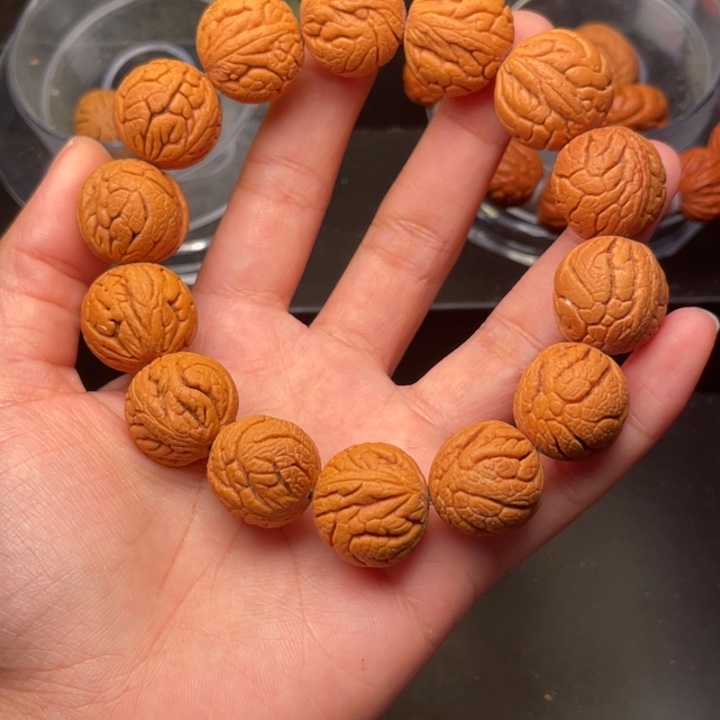 桃核手串金丝龙珠18