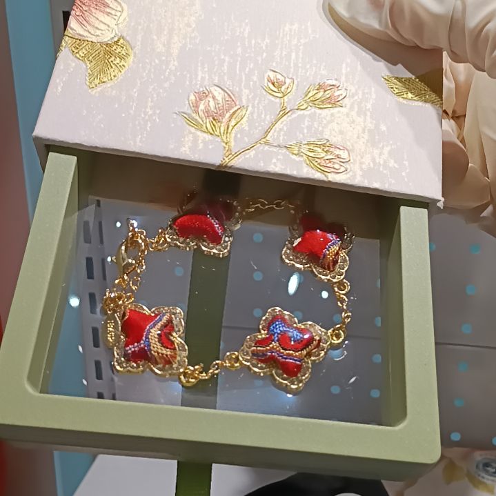 织绣和平小屋助力非遗蜀锦四芒星手链红色