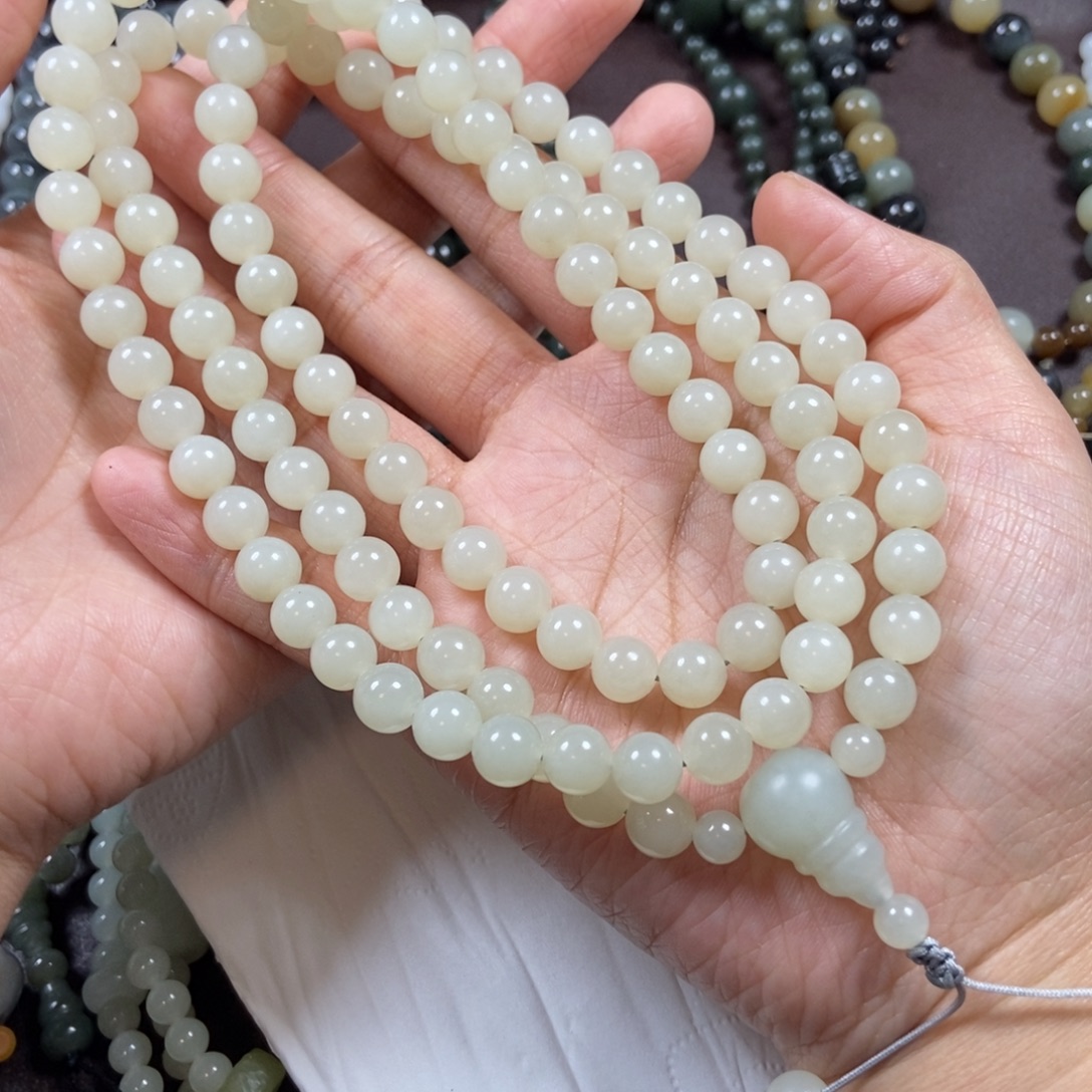 阳***：和田玉未镶嵌把件