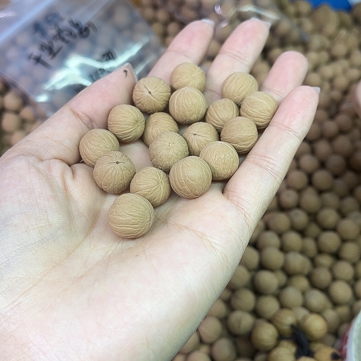 陌****猴头核桃吊坠聚宝盆二级籽100颗