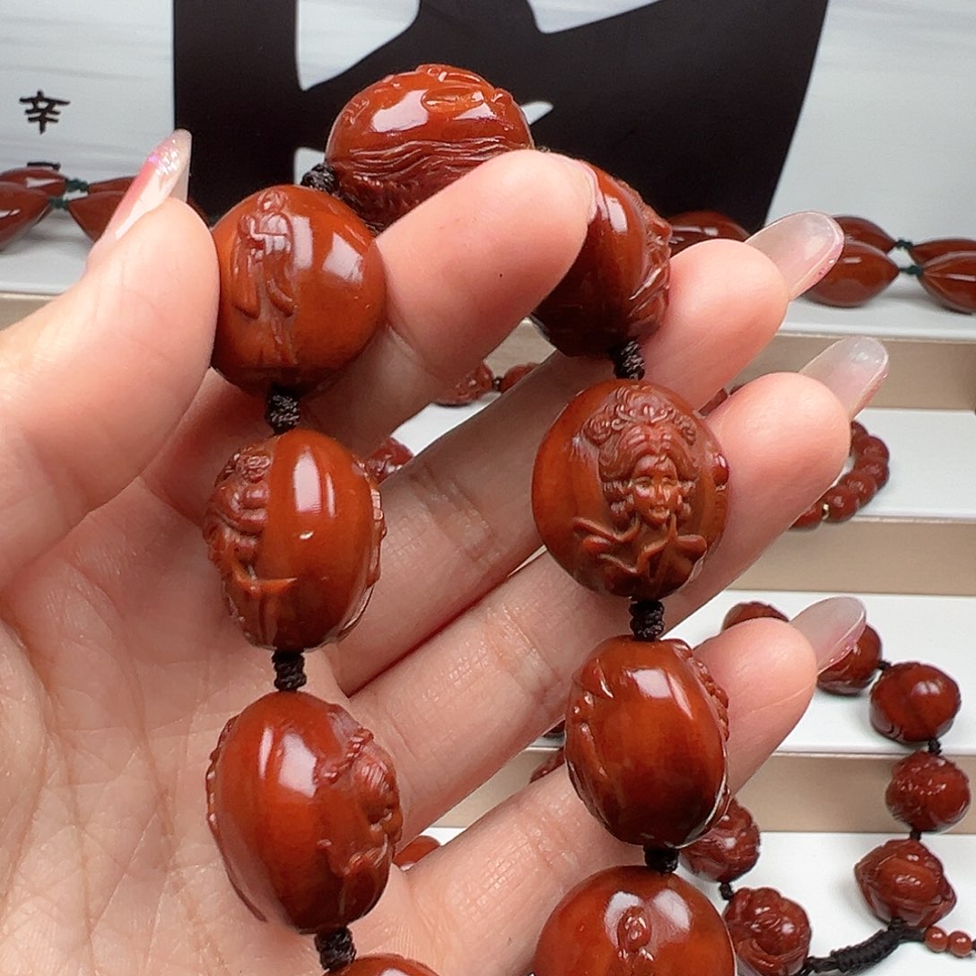 搬***爷手串橄榄核美女手串