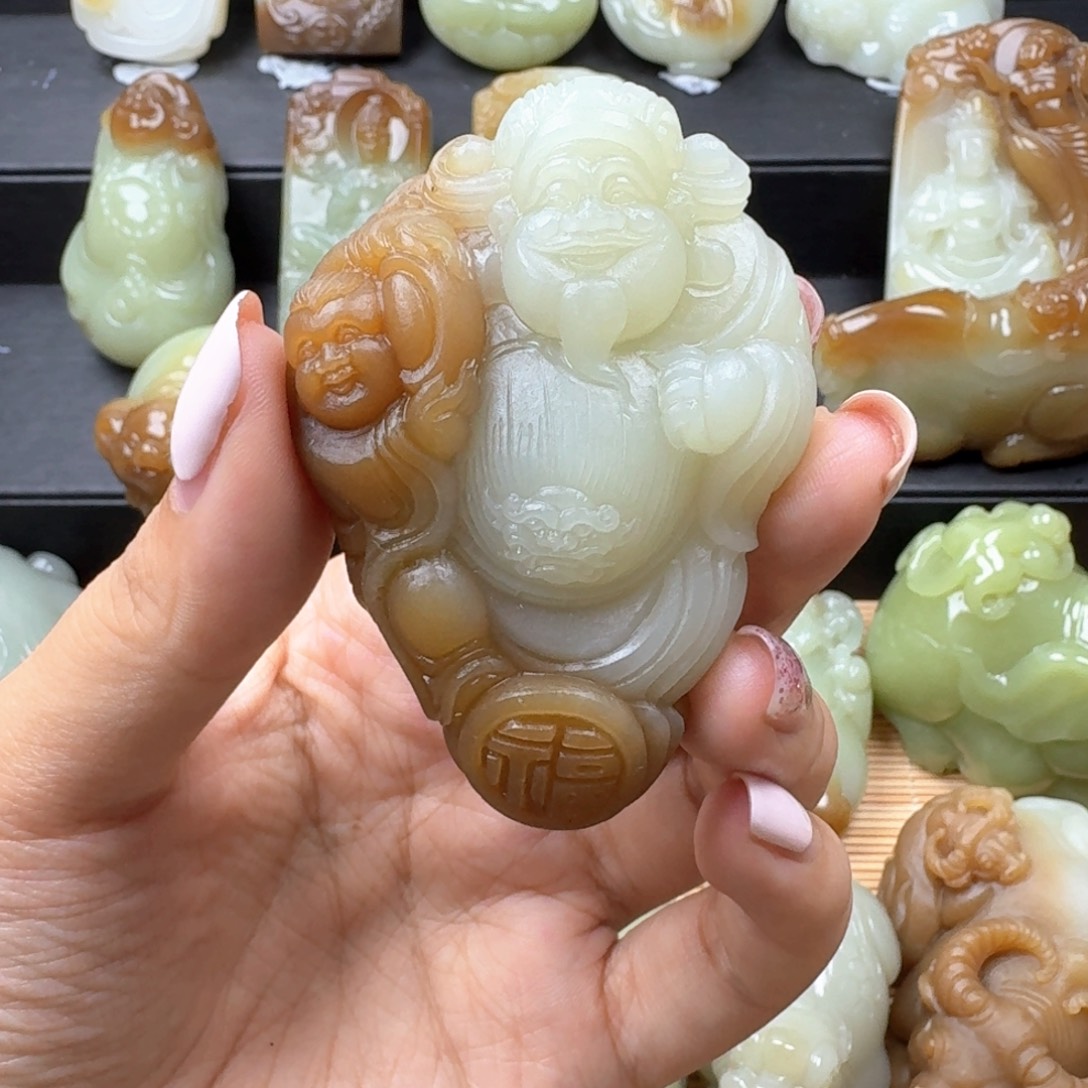 顺***。和田玉未镶嵌把件