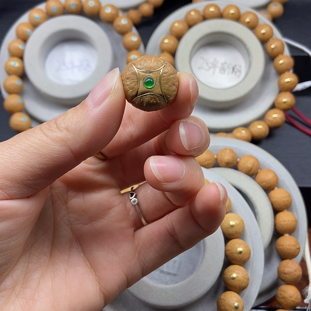 淡***伤凤眼菩提手串镶嵌麒麟