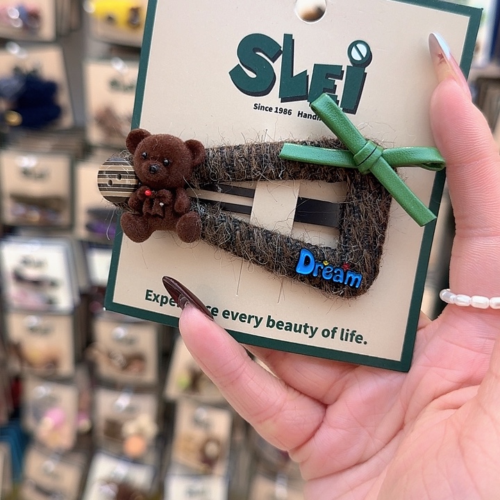 绿色皮蝴蝶结三角小熊掰掰