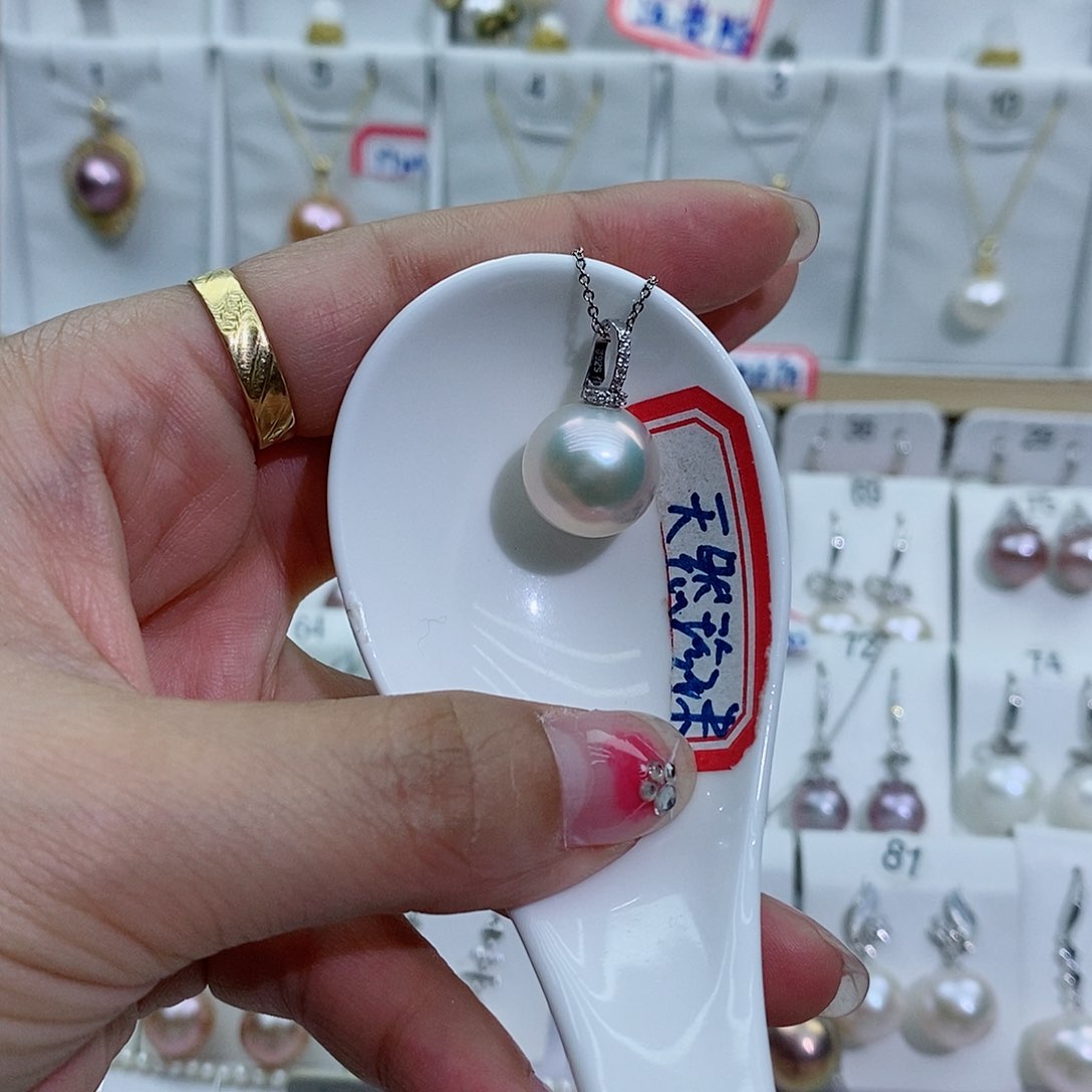 淡水珍珠银S925镶嵌吊坠(赠链)飘*