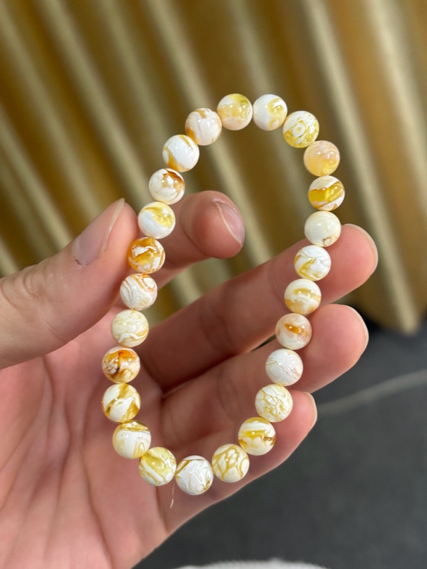 8+mm金漆白溶洞手串