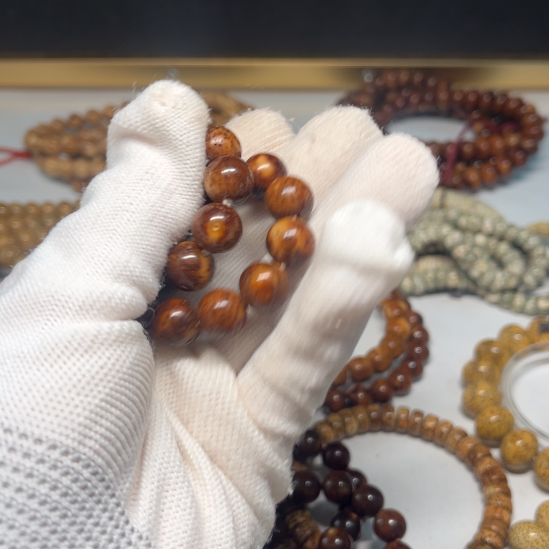 啸***海吊坠星月菩提11正圆珠深色老油料