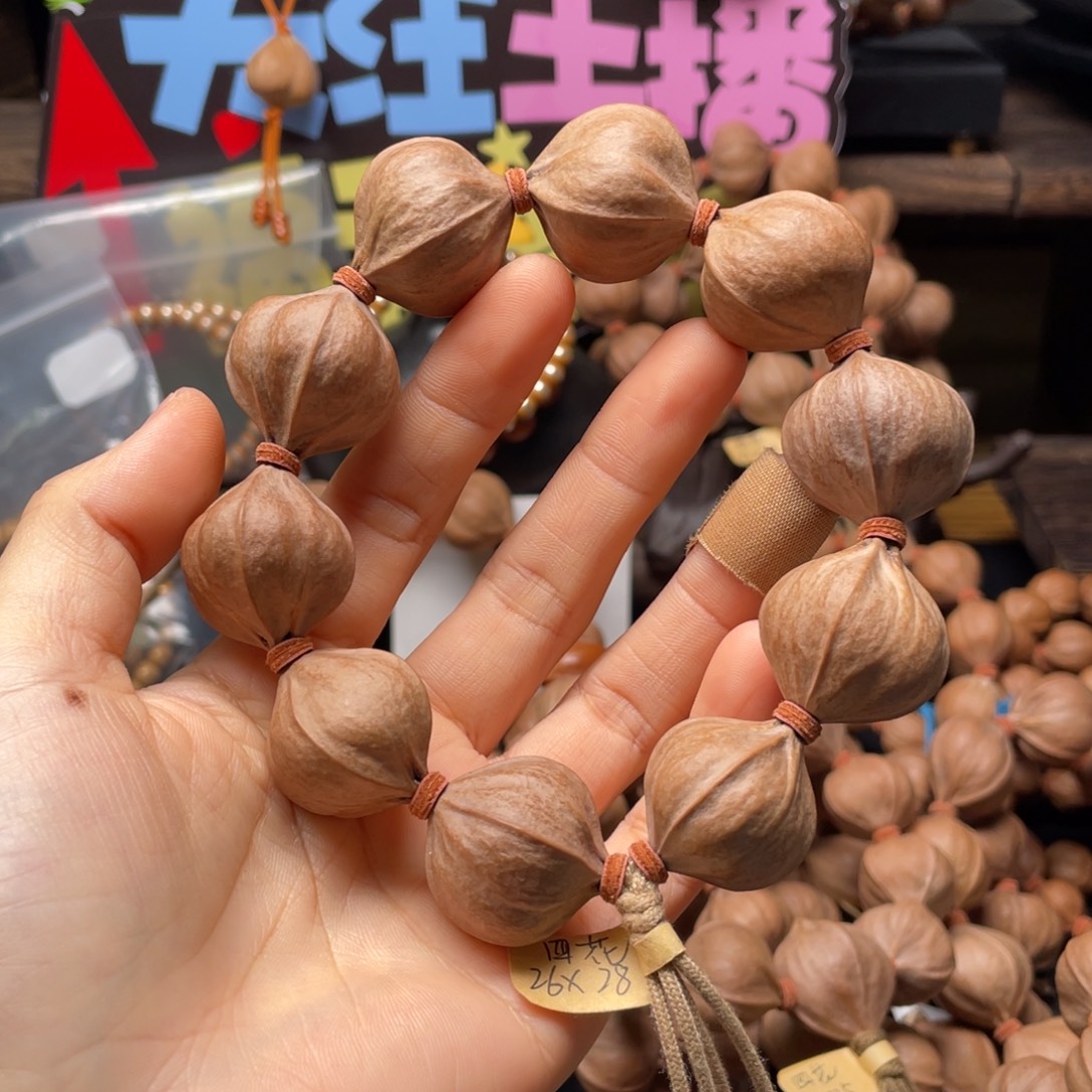 中***话橄榄核吊坠2628四花铁核