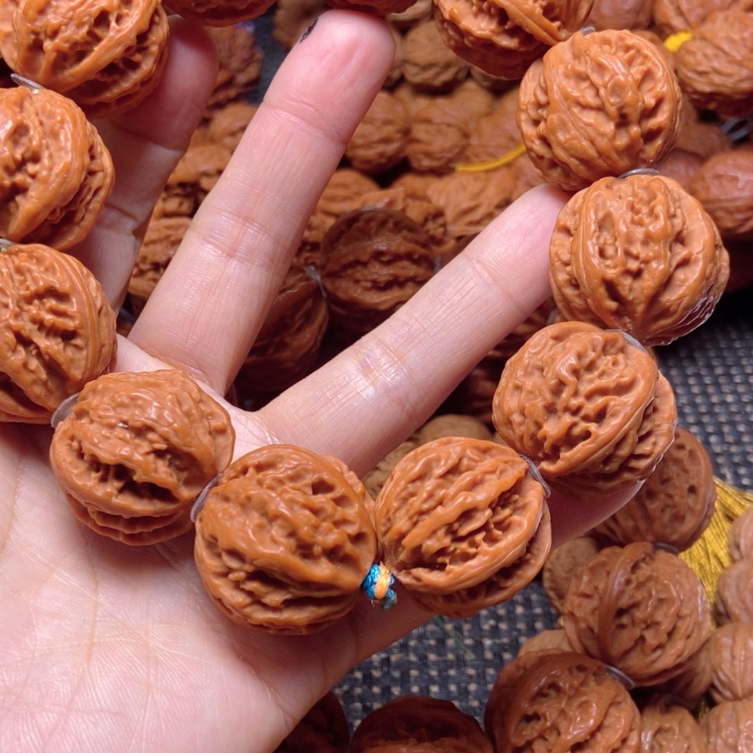 生***下吊坠桃核京八棱手串