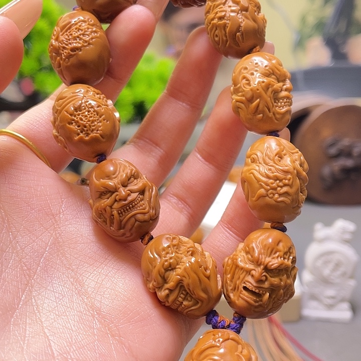 彩***头橄榄核吊坠橄榄核雕