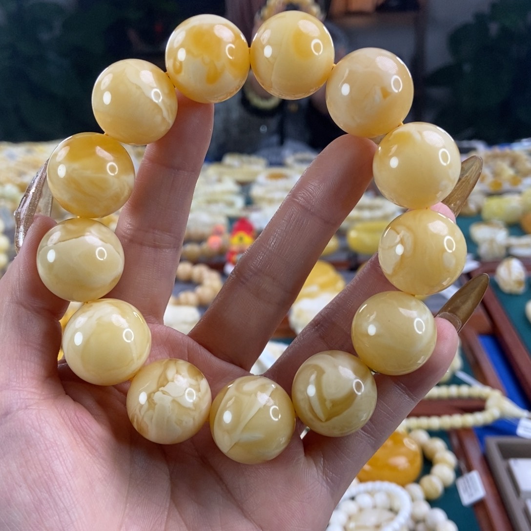 琥珀珠宝奇石未镶嵌小*哥20圆珠60.85