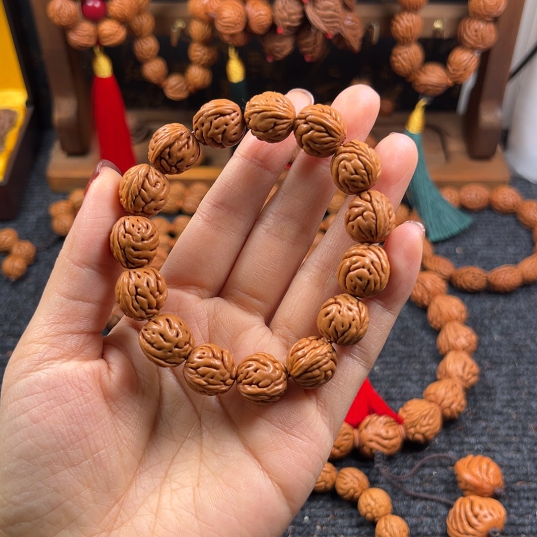 鱼***得吊坠桃核桃枭手串L1