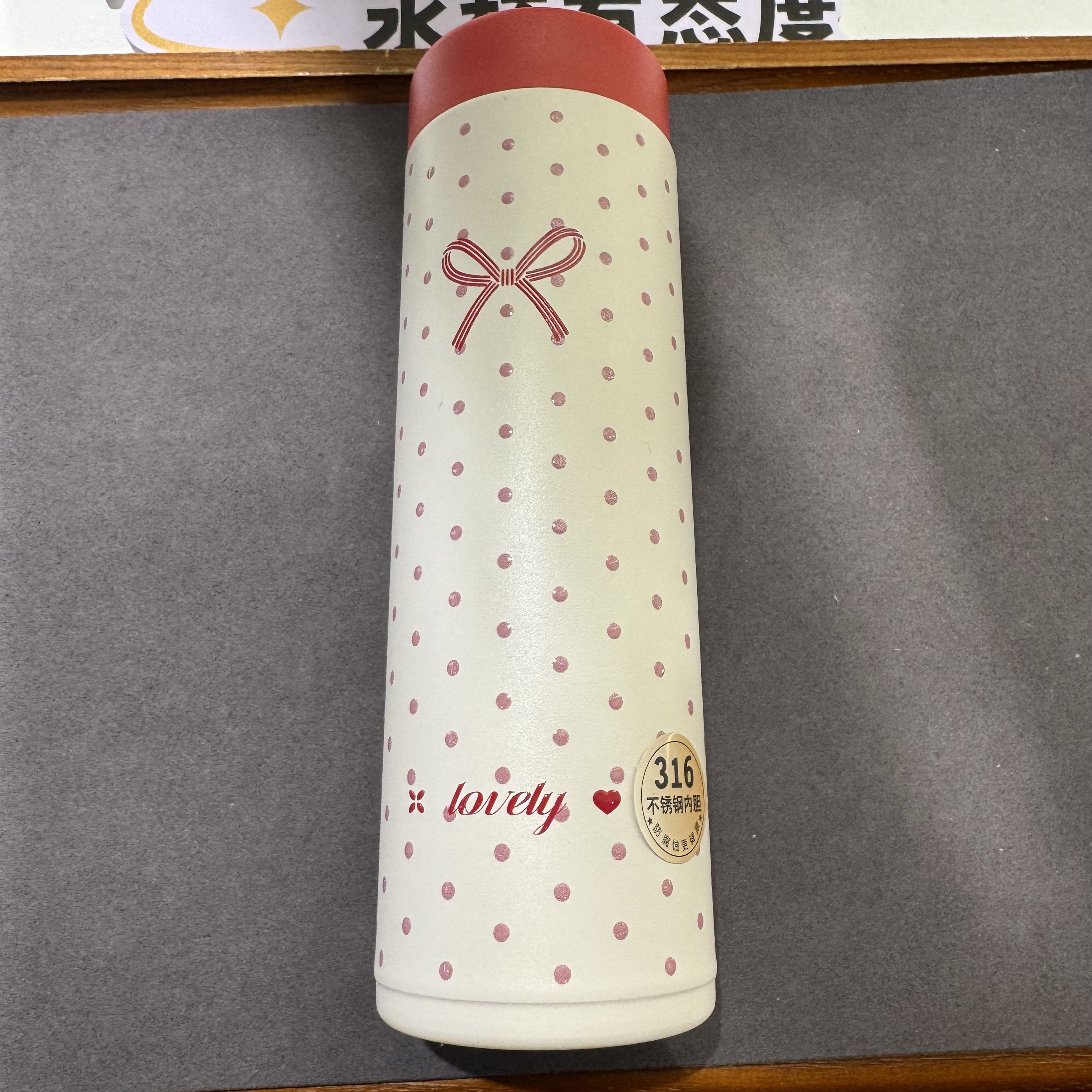 A443-红白蝴蝶结印字保温水杯一个