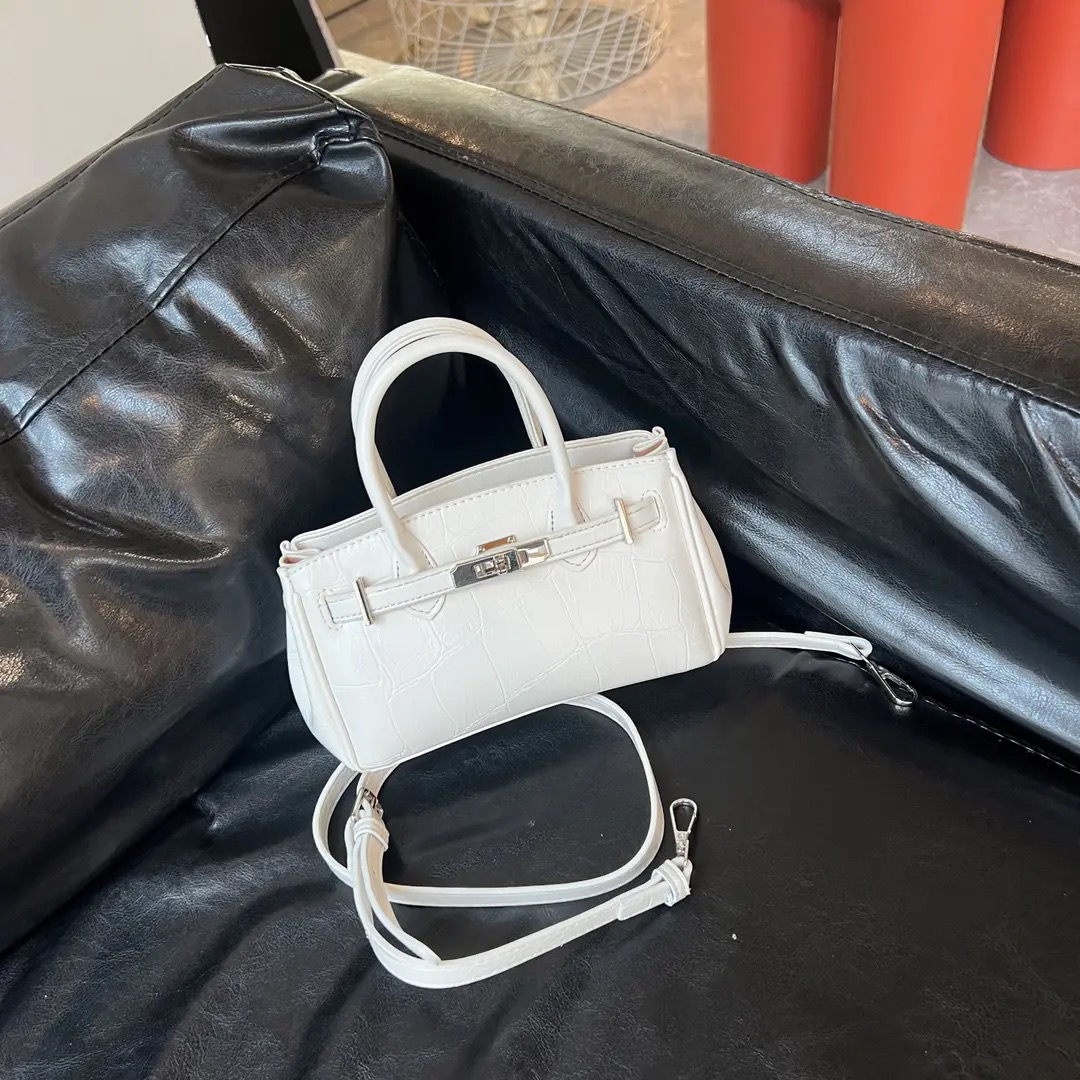 【里度】2025新款时尚通勤手提凯莉包女气质简约石头纹单肩斜挎包