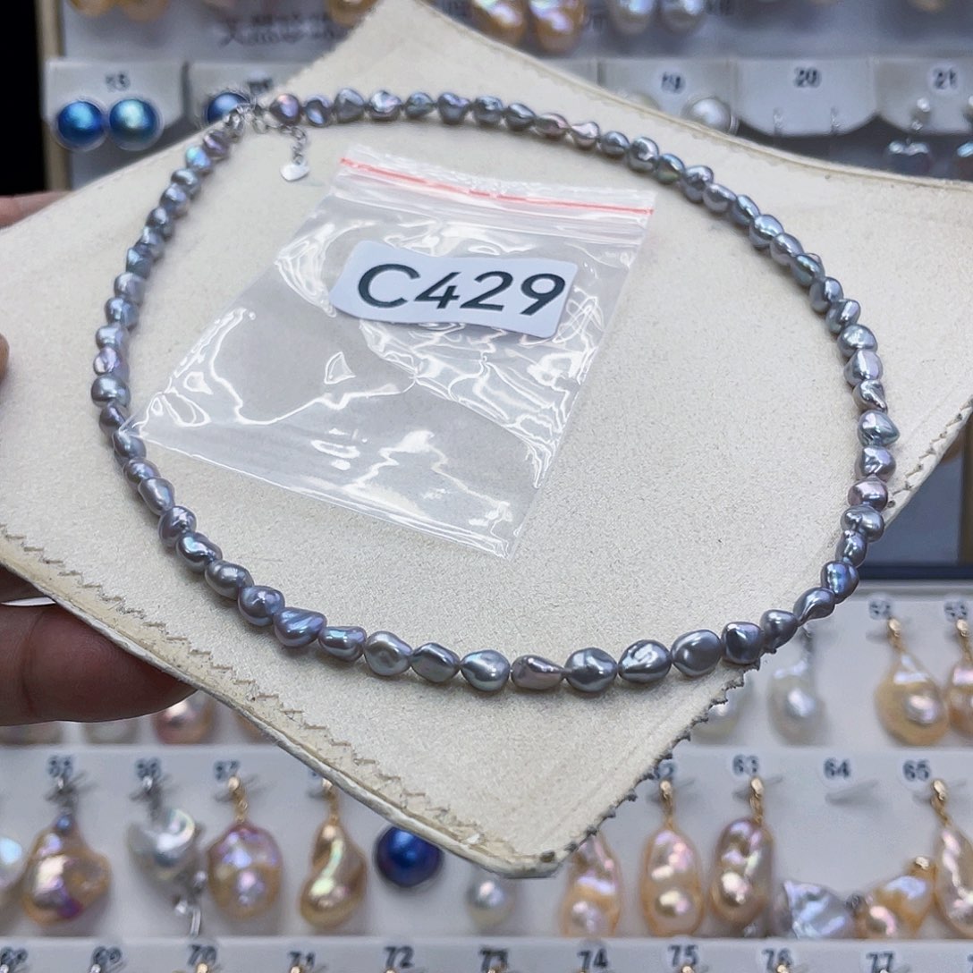 淡水珍珠未镶嵌颈饰哆****袋