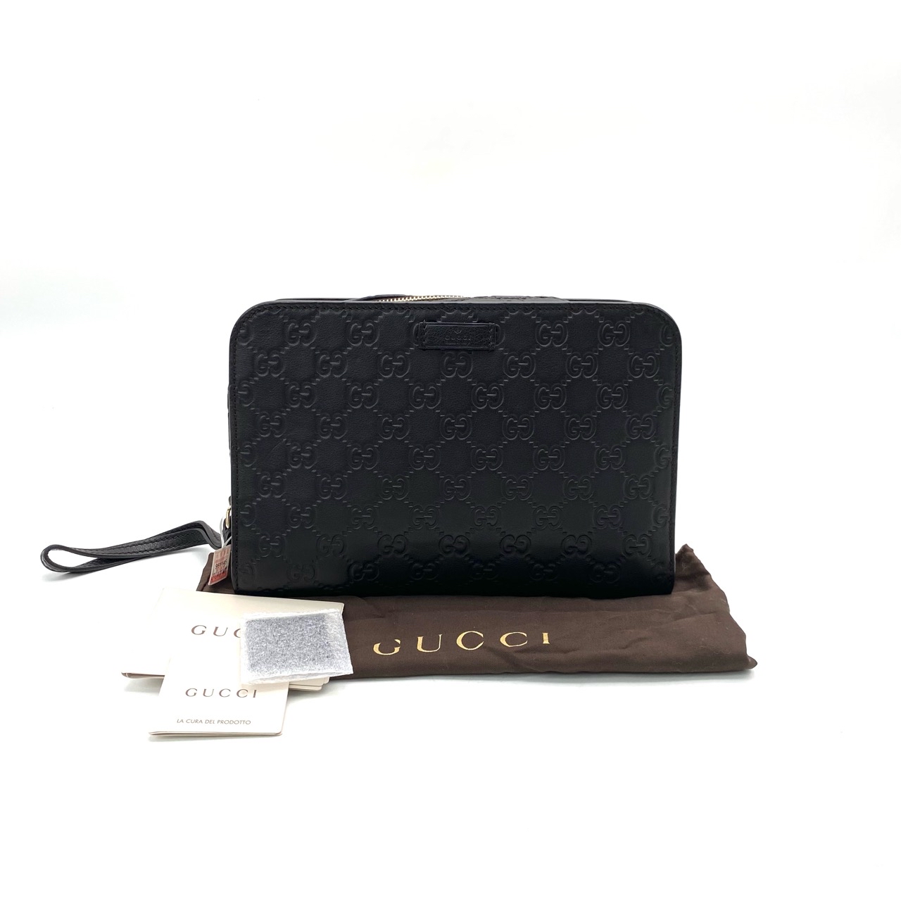 95新 GUCCI/古驰 98新黑色全皮压花手拿包 尺寸24/17