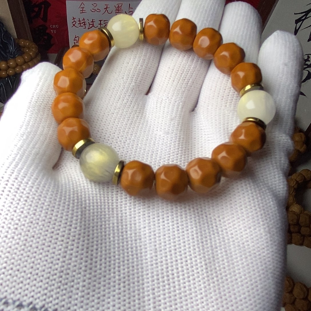 说***辞猴头核桃把件全品奶酪