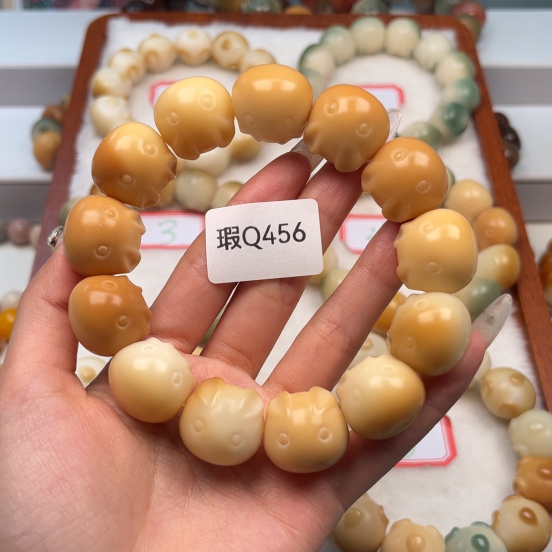 菩提根/象牙果手串小****?瑕q456兔子一串20mm