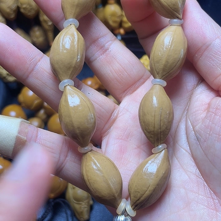 吊坠橄榄核啦啦啦啦