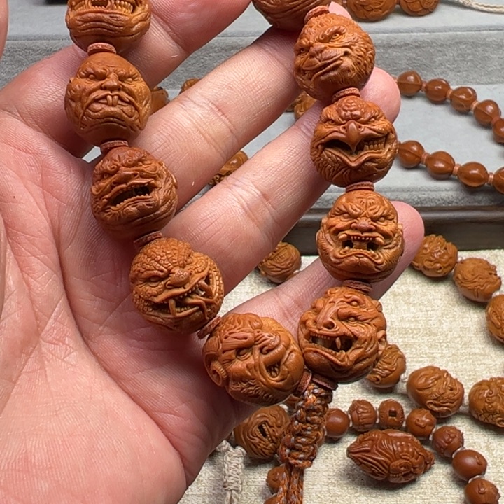 辉***0橄榄核手串橄榄核雕工艺制作