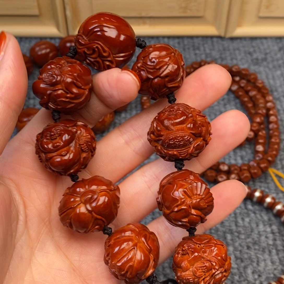 奈***品橄榄核手串/手链荷叶财迷