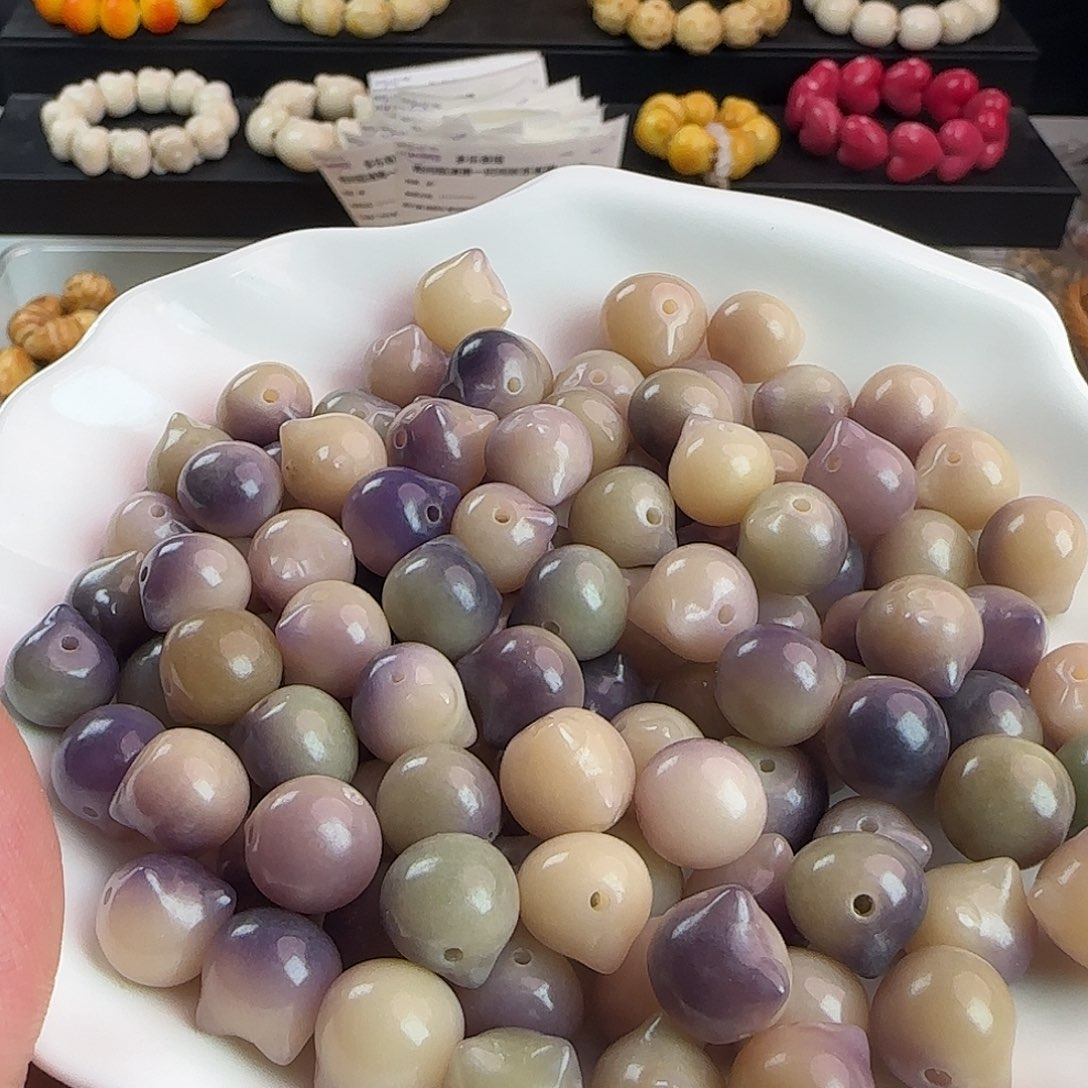 菩提根/象牙果手串卡11-12紫色猫头300颗批发
