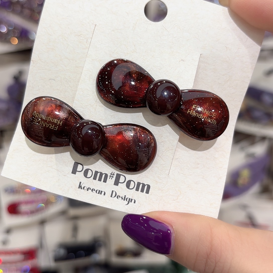 皮质铁合金红棕蝴蝶结压夹