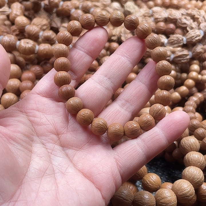 秋***.猴头核桃手串1.0同尺小风羽