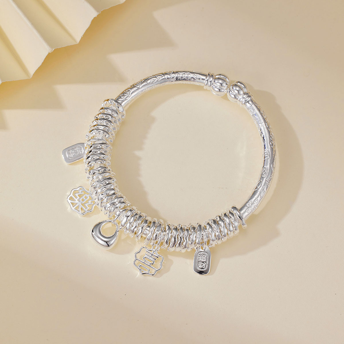 999.9银南瓜头平安喜乐盘缠开口镯