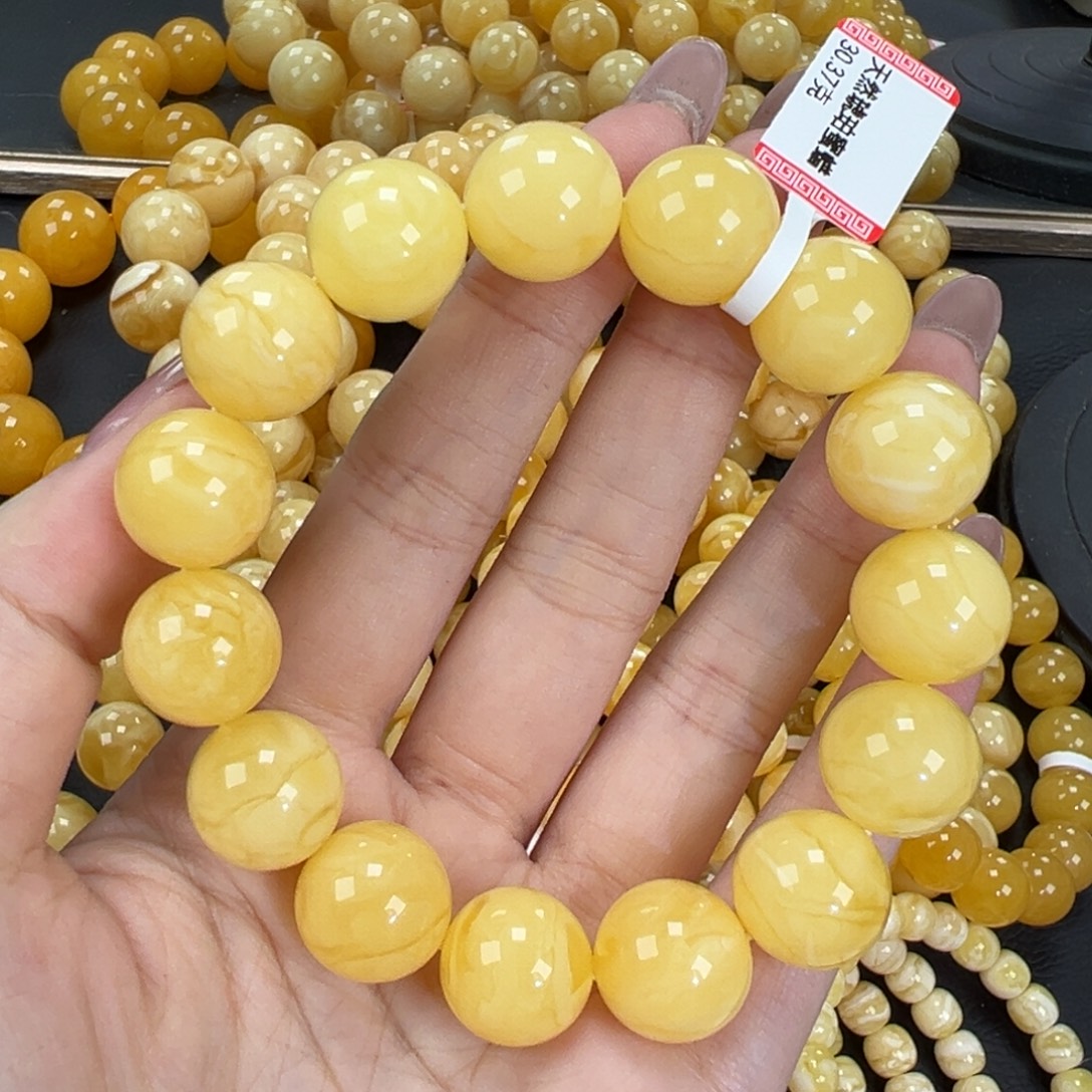 琥珀未镶嵌手链30.4黄白妖花