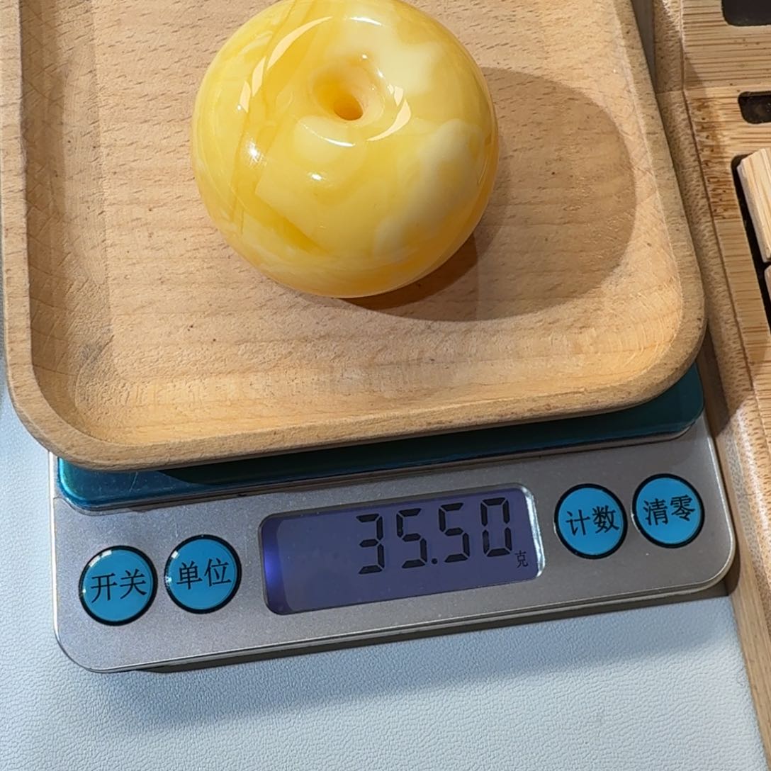 琥珀裸石未镶嵌42.7X29.5m橘白花扣子35.5