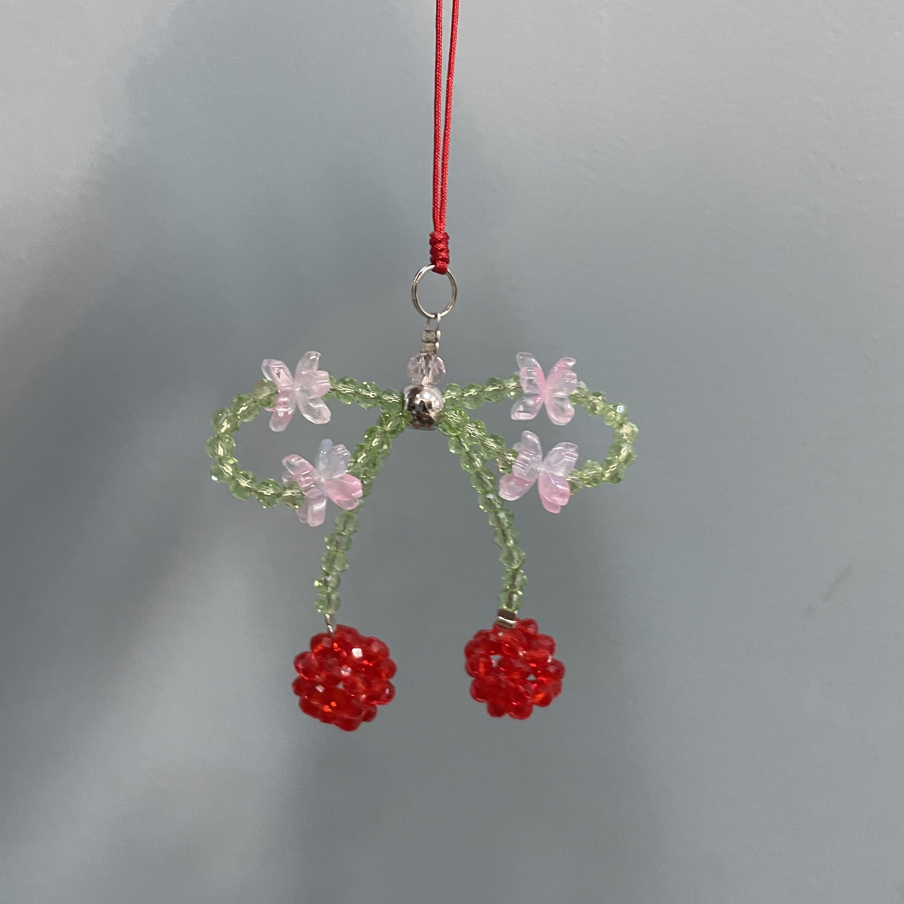 绳款编织蝴蝶结樱桃款手机坠E400