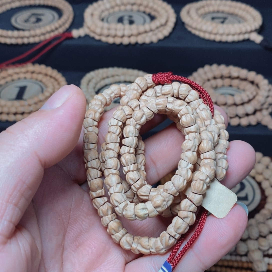 柏香籽/百香籽手串李**?