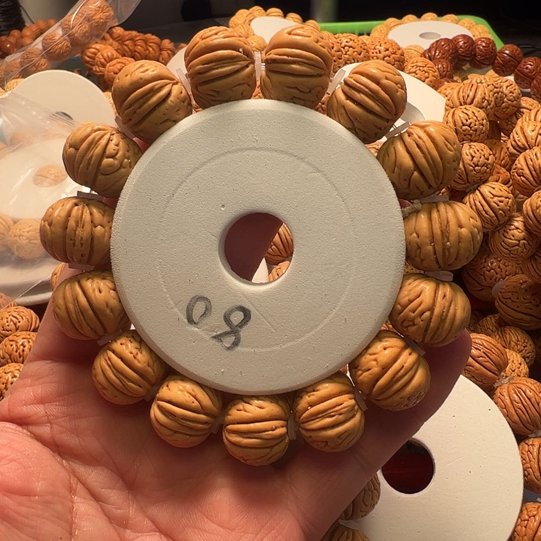 手串桃核肉纹元宝