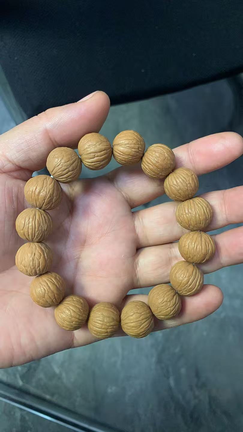 猴头核桃凤羽手串