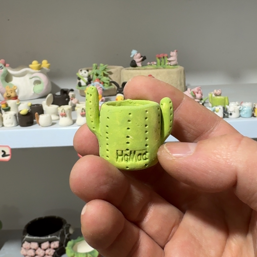 菀***…厂家直销手工花盆摆件