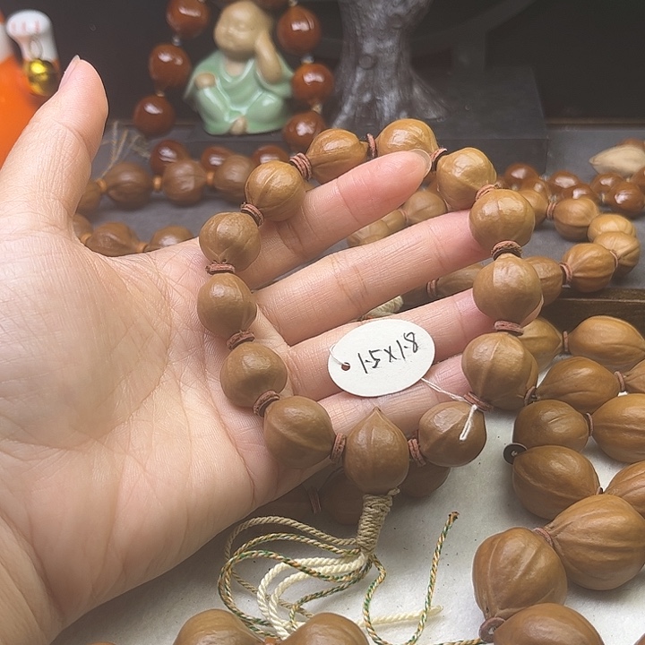 随***便橄榄核手串/手链1.5*1.8原皮三花带三通铁核