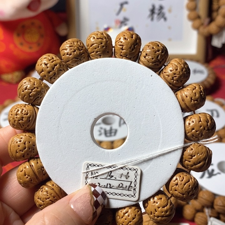 桃核手串条**?树王纽扣16
