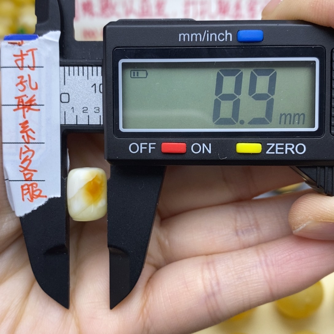 琥珀裸石未镶嵌8.9✖️11.3白花蜡小桶珠
