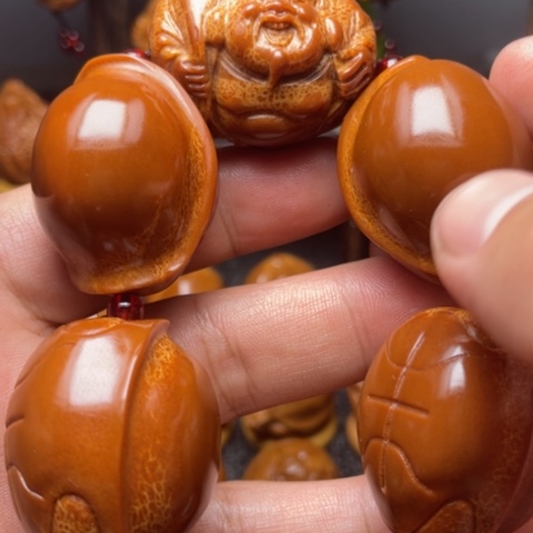 橄榄核手串/手链元宝富甲手持一条3.3左右