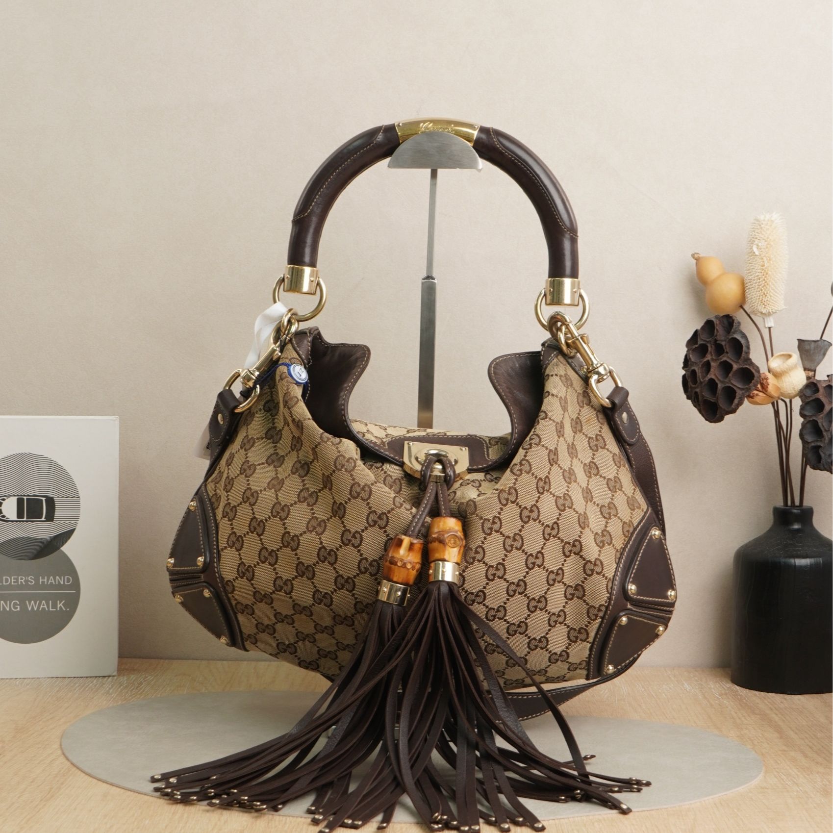 99新 GUCCI/古驰 古驰流苏腋下包/DS045690