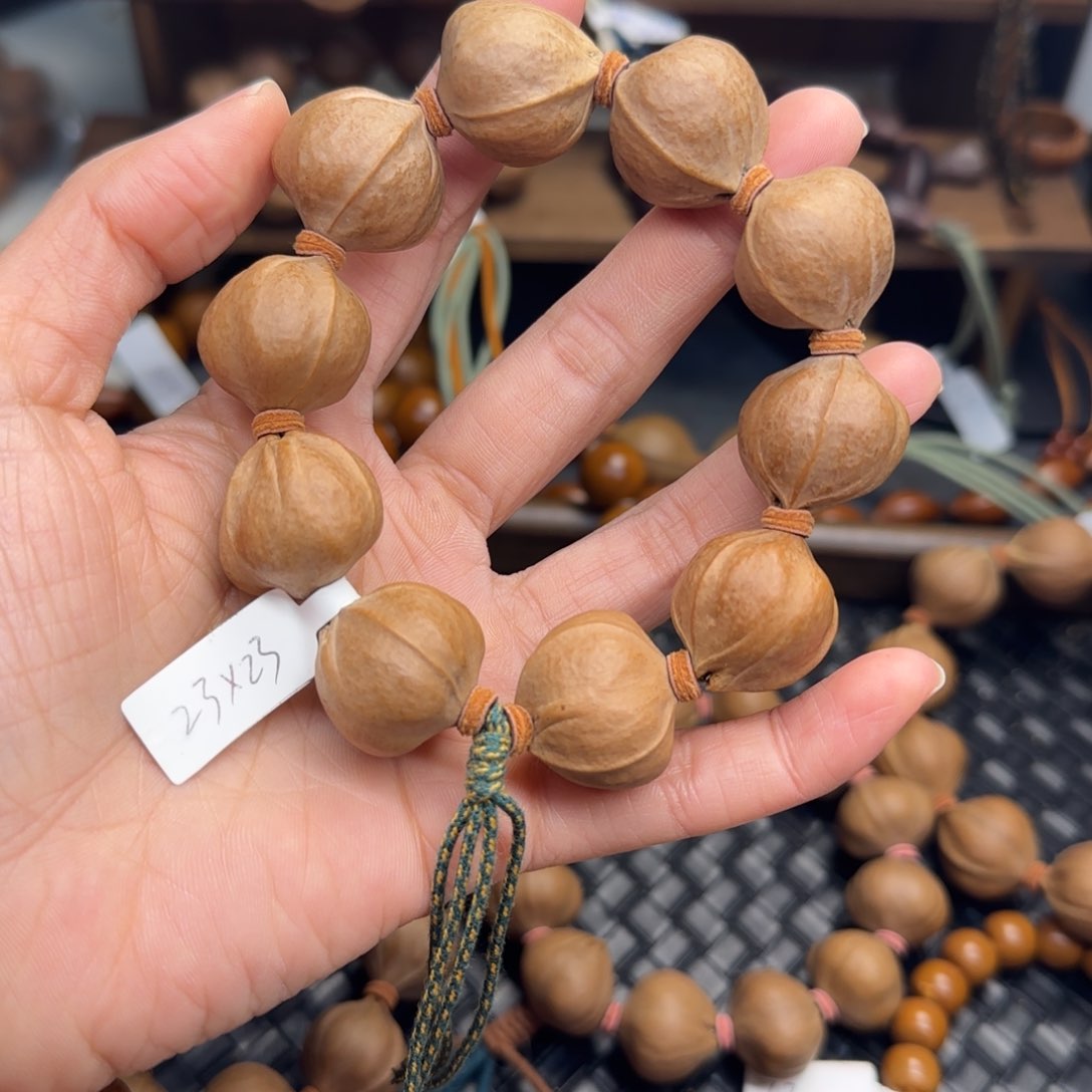 手串橄榄核15。2.3*2.3梅林铁