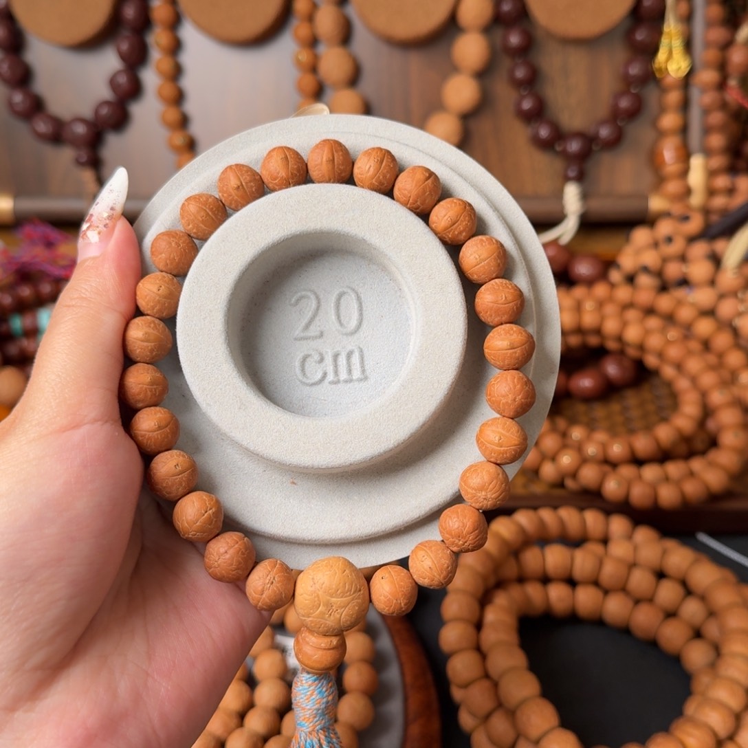 辻***弌凤眼菩提把件11红皮单圈