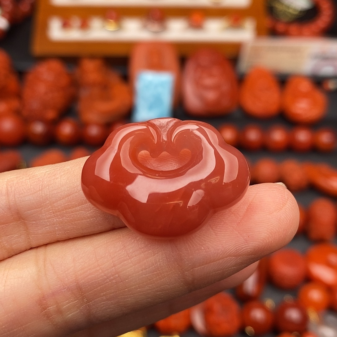 南红玛瑙四川凉山如意锁编绳未镶嵌