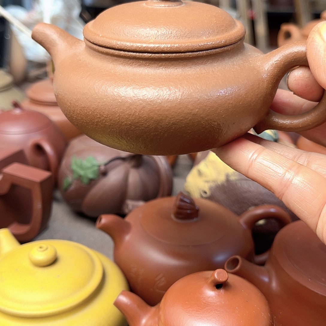 茶壶紫砂全手工制作和半手工制作