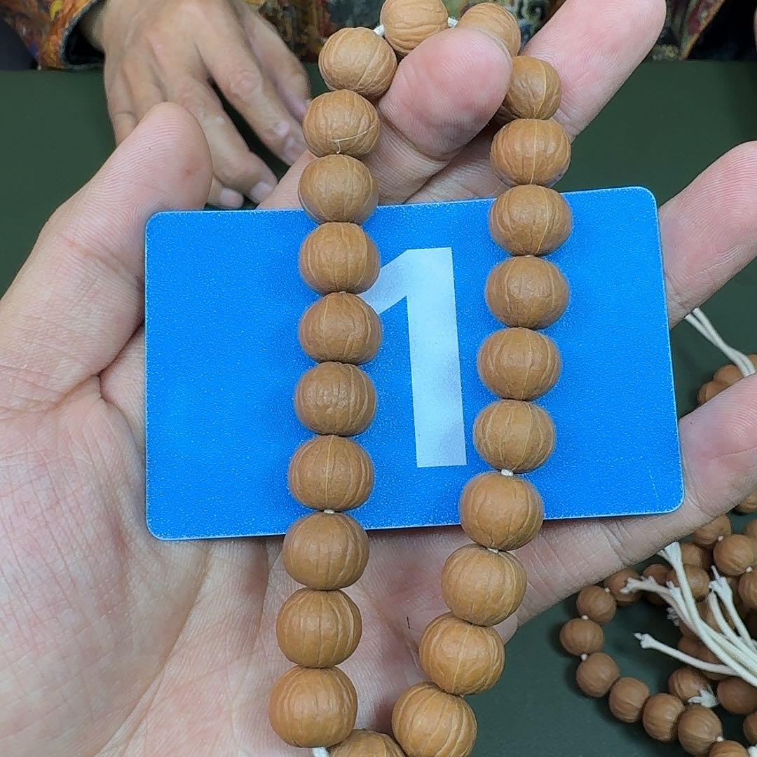 吊坠猴头核桃13➕猴头凤羽。   1