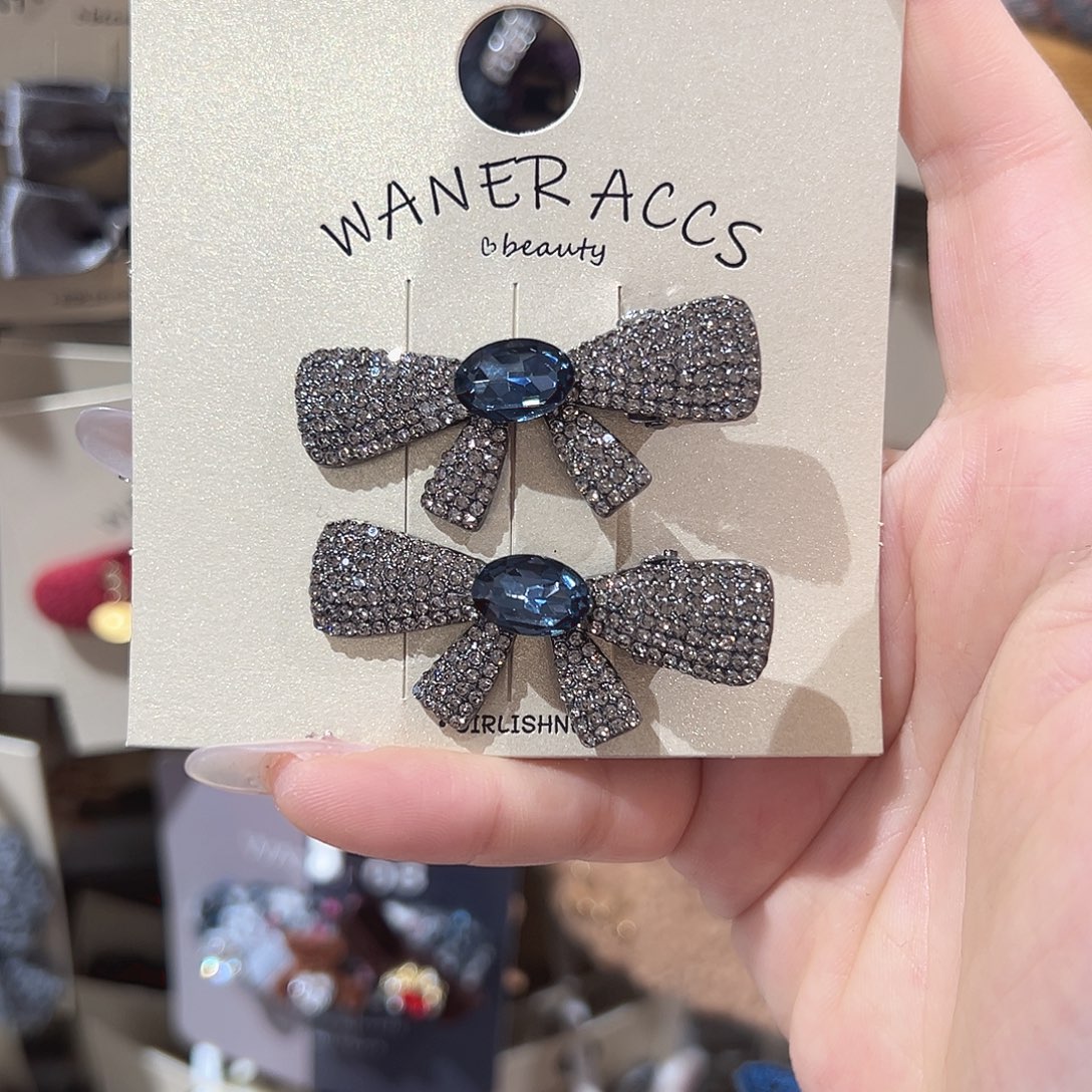 羽毛不锈钢蝴蝶结鸭夹