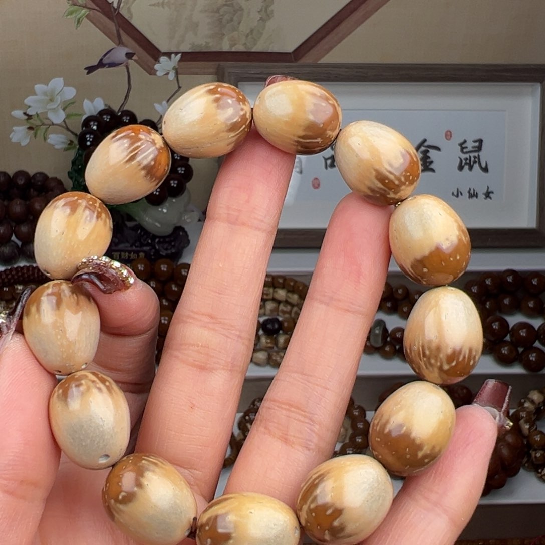 紫金鼠手串给****啊半实心花皮枣珠 福利款